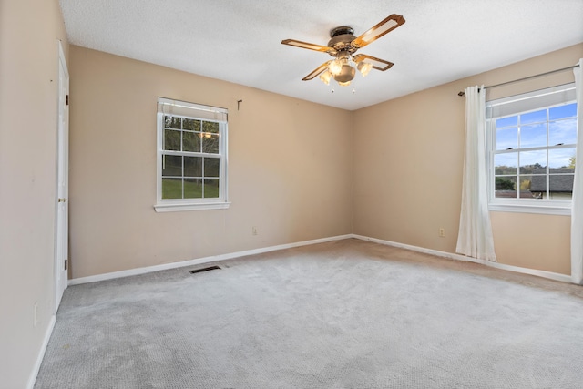 7004 Lystra Rd, Harrison, TN 37341 - carpeted spare room featuring a ceiling fan and baseboards