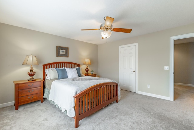 bedroom with baseboards and carpet flooring