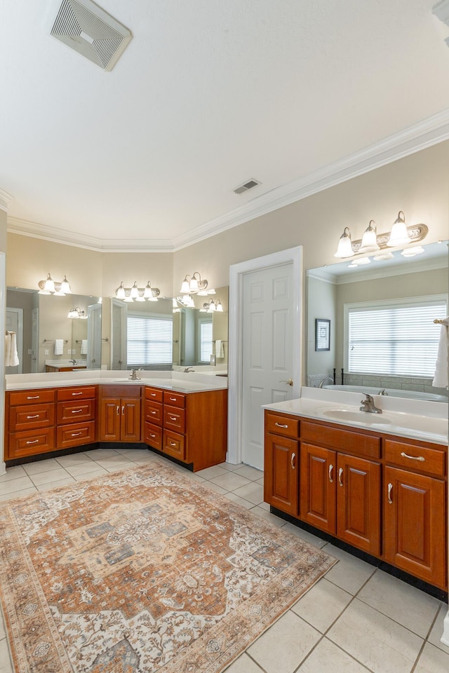 bathroom featuring crown molding, visible vents, and tile patterned floors