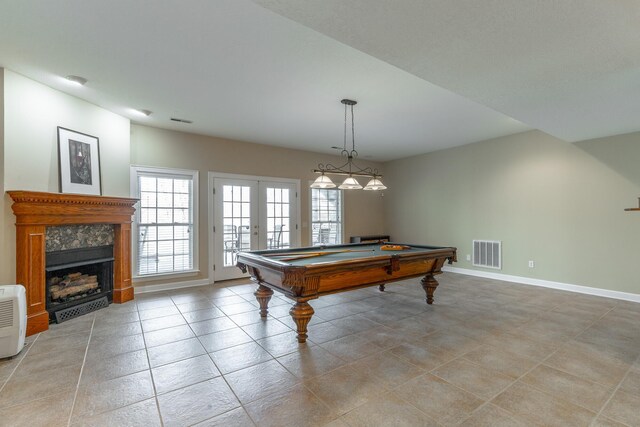 playroom featuring a high end fireplace, light tile patterned flooring, billiards, baseboards, and visible vents