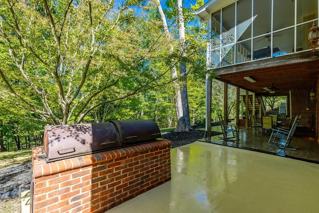 view of patio / terrace featuring ceiling fan