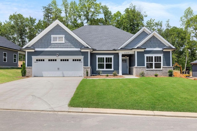 11819 Herons Haven Dr # 102, Soddy Daisy, TN 37379 - craftsman-style house featuring a garage, a front lawn, driveway, and stone siding