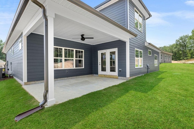 11819 Herons Haven Dr # 102, Soddy Daisy, TN 37379 - back of house with a ceiling fan, a patio, and a lawn