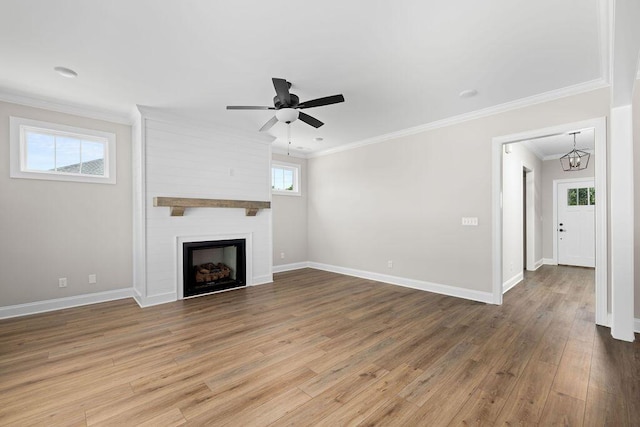 11819 Herons Haven Dr # 102, Soddy Daisy, TN 37379 - unfurnished living room with ornamental molding, a ceiling fan, wood finished floors, and baseboards