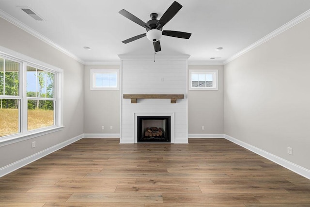 11819 Herons Haven Dr # 102, Soddy Daisy, TN 37379 - unfurnished living room with ornamental molding, wood finished floors, baseboards, a large fireplace, and ceiling fan