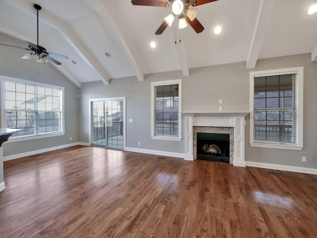 7954 Burgundy Cir Unit 91, Chattanooga, TN 37421 - unfurnished living room featuring vaulted ceiling with beams, baseboards, a fireplace, and ceiling fan
