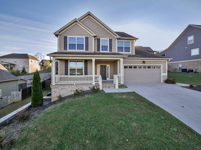 7954 Burgundy Cir Unit 91, Chattanooga, TN 37421 - view of front of home featuring cooling unit, concrete driveway, a porch, and a front yard