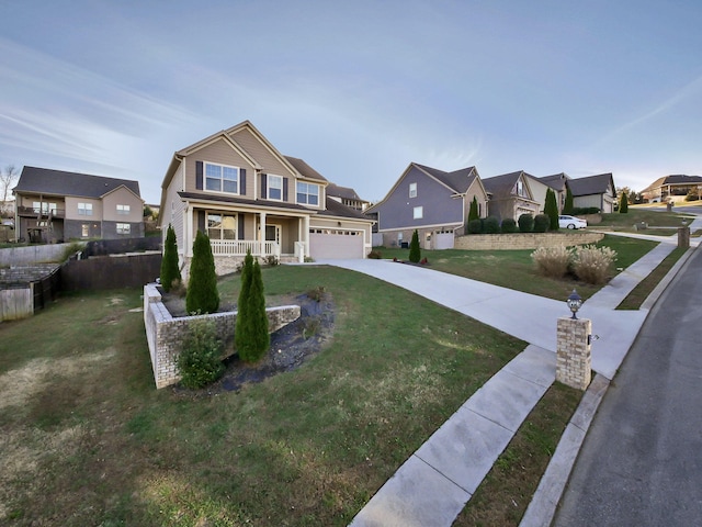 7954 Burgundy Cir Unit 91, Chattanooga, TN 37421 - view of front of house featuring a residential view, driveway, a front yard, and covered porch