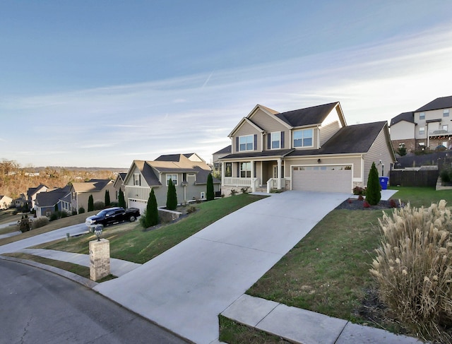 7954 Burgundy Cir Unit 91, Chattanooga, TN 37421 - view of front of house with a front lawn, a residential view, driveway, and a porch