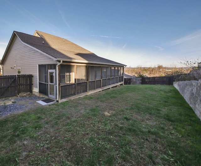 7954 Burgundy Cir Unit 91, Chattanooga, TN 37421 - view of yard featuring a sunroom and a fenced backyard