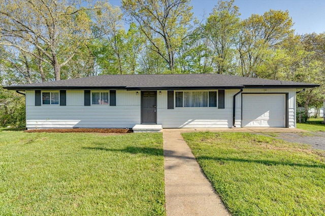 32 Kent Dr, Rossville, GA 30741 - ranch-style home featuring roof with shingles, an attached garage, a front lawn, and aphalt driveway