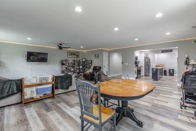 dining space featuring ceiling fan, light wood-type flooring, visible vents, recessed lighting, and baseboards
