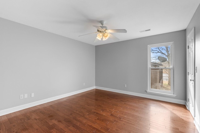 204 Lake Haven Dr, Soddy Daisy, TN 37379 - spare room with wood finished floors, ceiling fan, and baseboards