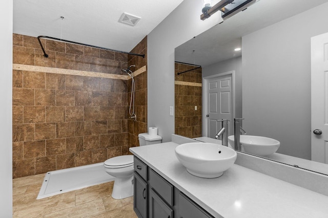 204 Lake Haven Dr, Soddy Daisy, TN 37379 - full bath with tiled shower, vanity, and toilet