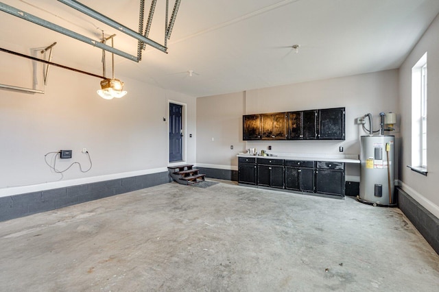 204 Lake Haven Dr, Soddy Daisy, TN 37379 - garage with electric water heater and a garage door opener