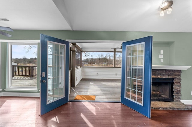 204 Lake Haven Dr, Soddy Daisy, TN 37379 - entryway featuring wood-type flooring, healthy amount of natural light, ceiling fan, and a stone fireplace