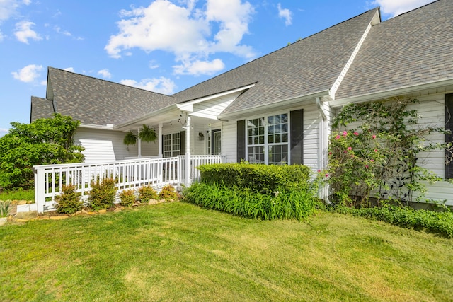 204 Lake Haven Dr, Soddy Daisy, TN 37379 - rear view of property featuring covered porch, a yard, and a shingled roof