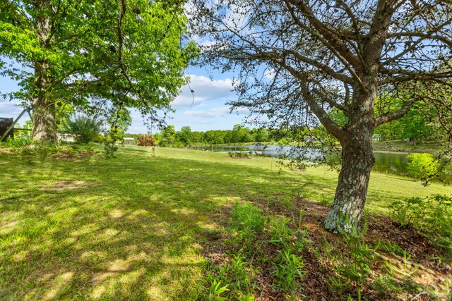 204 Lake Haven Dr, Soddy Daisy, TN 37379 - view of green lawn featuring a water view