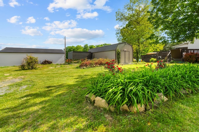 204 Lake Haven Dr, Soddy Daisy, TN 37379 - view of green lawn with an outbuilding