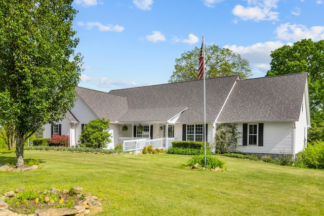 204 Lake Haven Dr, Soddy Daisy, TN 37379 - view of front facade featuring covered porch, roof with shingles, and a front lawn