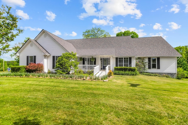 204 Lake Haven Dr, Soddy Daisy, TN 37379 - ranch-style house featuring a porch, a front lawn, and a shingled roof