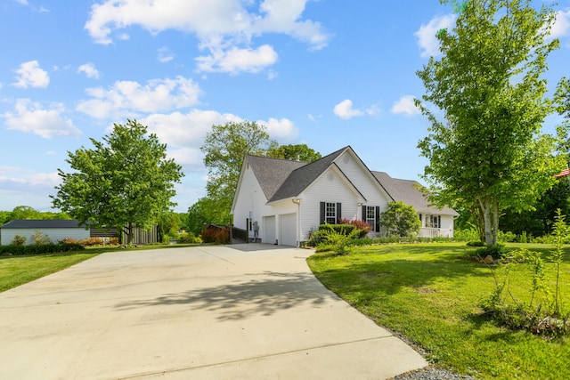 204 Lake Haven Dr, Soddy Daisy, TN 37379 - view of front facade featuring driveway, a garage, and a front lawn