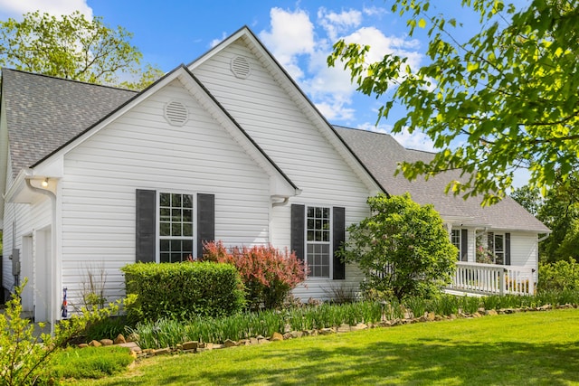 204 Lake Haven Dr, Soddy Daisy, TN 37379 - rear view of property with a yard and roof with shingles