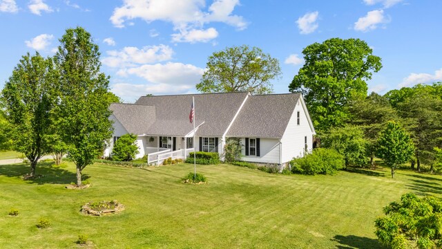 204 Lake Haven Dr, Soddy Daisy, TN 37379 - view of front of home featuring a front yard and roof with shingles