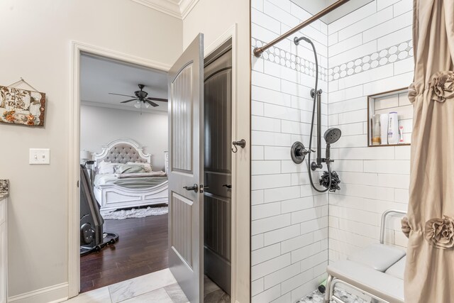 137 Elm Ave, Ringgold, GA 30736 - full bath featuring ornamental molding, ensuite bath, ceiling fan, baseboards, and a tile shower