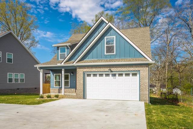 craftsman-style house with driveway, board and batten siding, covered porch, a garage, and brick siding