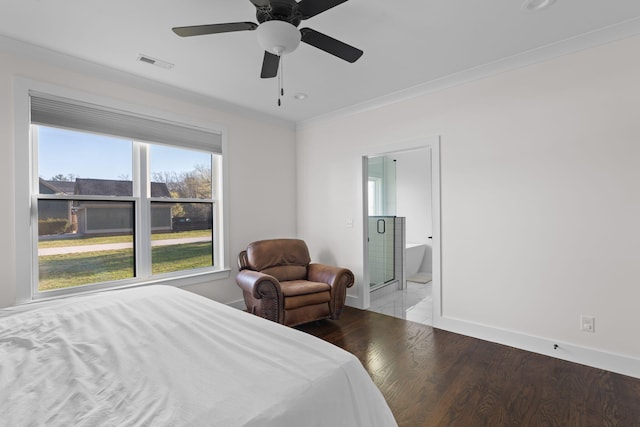 bedroom featuring a ceiling fan, wood finished floors, baseboards, visible vents, and ornamental molding