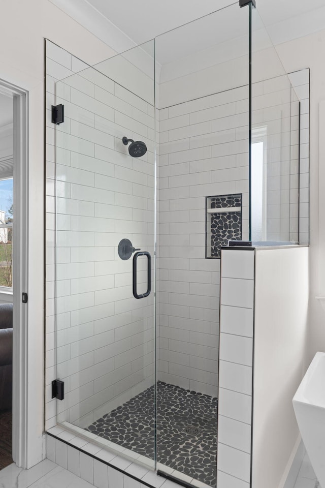 bathroom featuring a shower stall