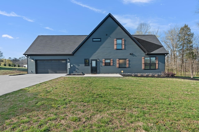 modern farmhouse style home with a front lawn, an attached garage, and concrete driveway