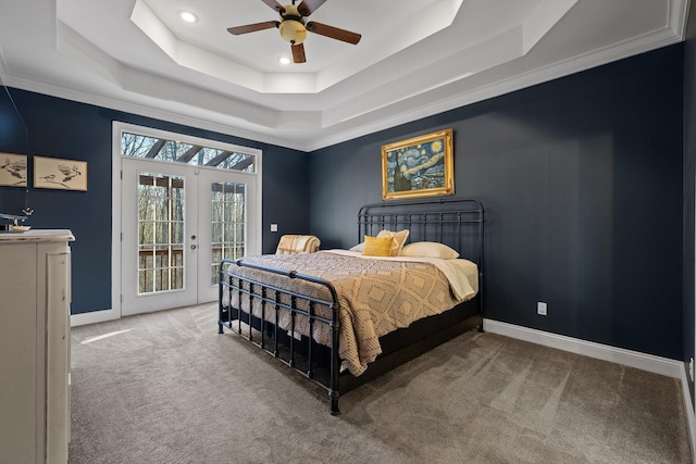 carpeted bedroom with french doors, baseboards, a raised ceiling, access to exterior, and ceiling fan