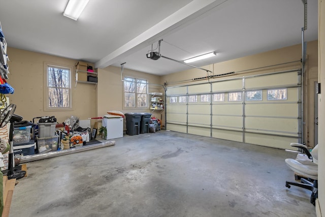 garage featuring a garage door opener