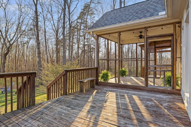 wooden terrace with a sunroom