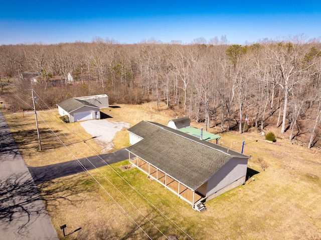 aerial view featuring a wooded view