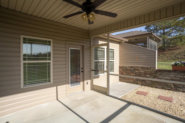 view of patio featuring ceiling fan