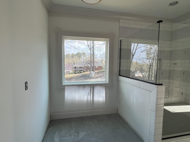 581 Benson Dr, Chattanooga, TN 37412 - bathroom with baseboards, tiled shower, and tile patterned floors