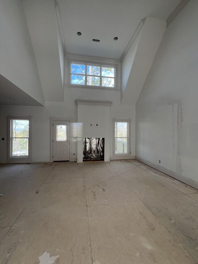 581 Benson Dr, Chattanooga, TN 37412 - unfurnished living room featuring a high ceiling and healthy amount of natural light