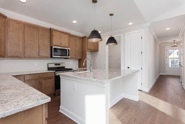 05 Nature Trl, Soddy Daisy, TN 37379 - kitchen with appliances with stainless steel finishes, crown molding, dark wood finished floors, brown cabinets, and decorative light fixtures