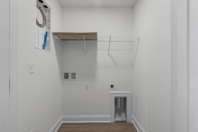 washroom featuring baseboards, dark wood-style floors, electric dryer hookup, laundry area, and washer hookup