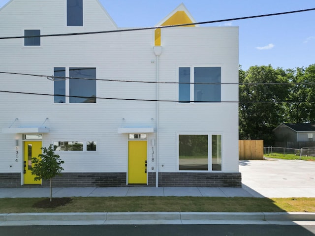 view of front of property with fence