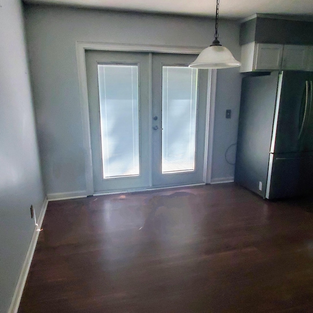 1603 Lisa Lynn Dr, Hixson, TN 37343 - unfurnished room featuring baseboards and dark wood finished floors