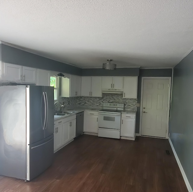 1603 Lisa Lynn Dr, Hixson, TN 37343 - kitchen featuring stainless steel appliances, light countertops, a textured ceiling, white cabinets, and dark wood finished floors