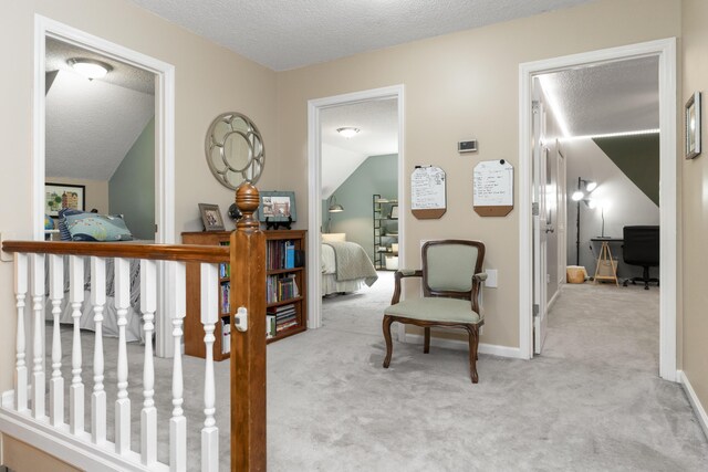 9215 Smokewood Trl, Chattanooga, TN 37421 - living area featuring carpet flooring, a textured ceiling, and an office area