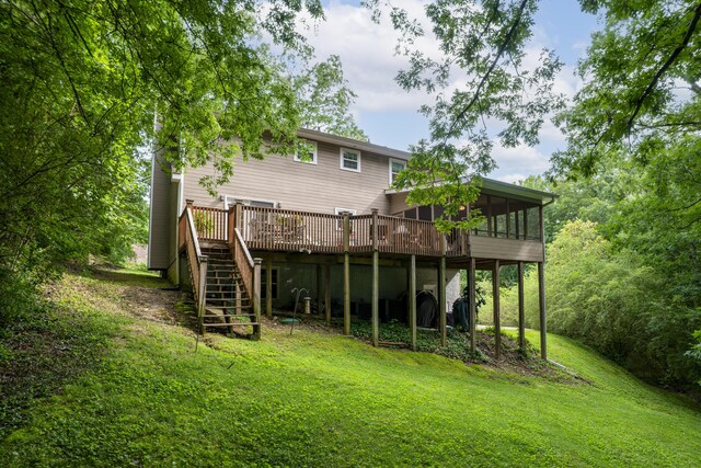 9215 Smokewood Trl, Chattanooga, TN 37421 - rear view of property with a sunroom, stairs, a deck, and a lawn