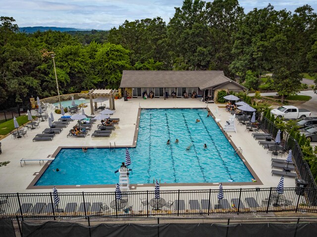 9215 Smokewood Trl, Chattanooga, TN 37421 - community pool with a patio, a pergola, and a forest view