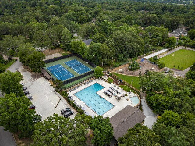 9215 Smokewood Trl, Chattanooga, TN 37421 - bird's eye view of a pool area and a heavily wooded area