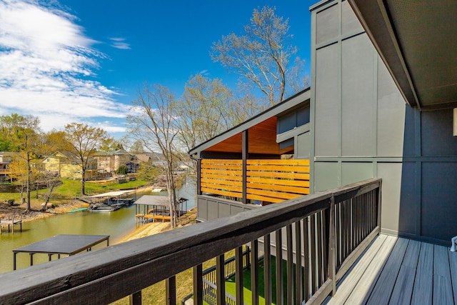 balcony featuring a water view